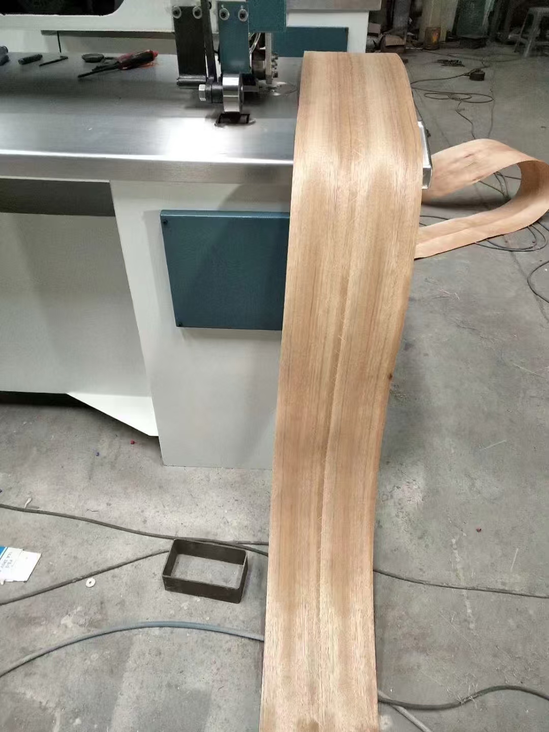 Finished spliced veneer sheet from veneer splicing machine